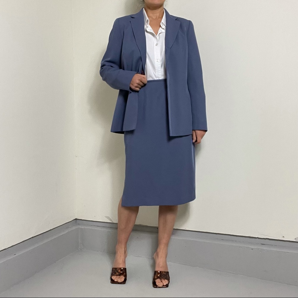 Blue suit with midi skirt. Great condition. Size 8.